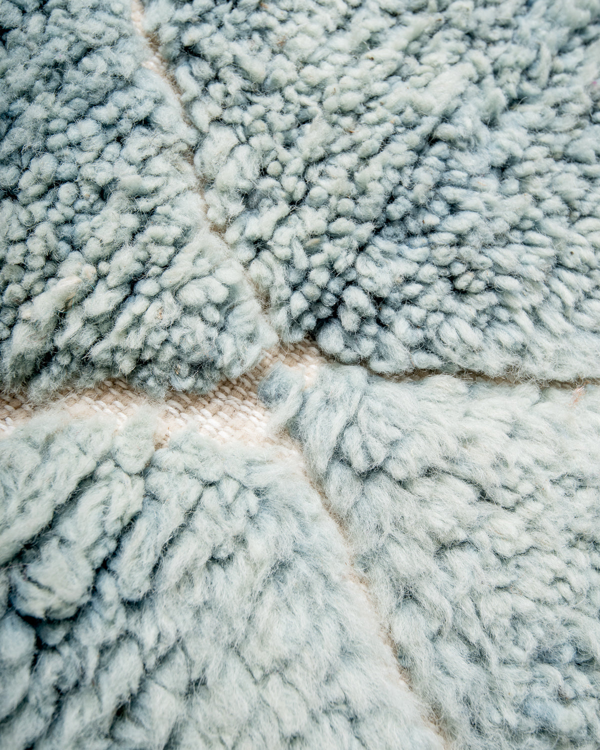 Modern, designer, handcrafted Berber rug from Morocco. Beniourain carpet with beautiful colours and patterns and fluffy wool texture.