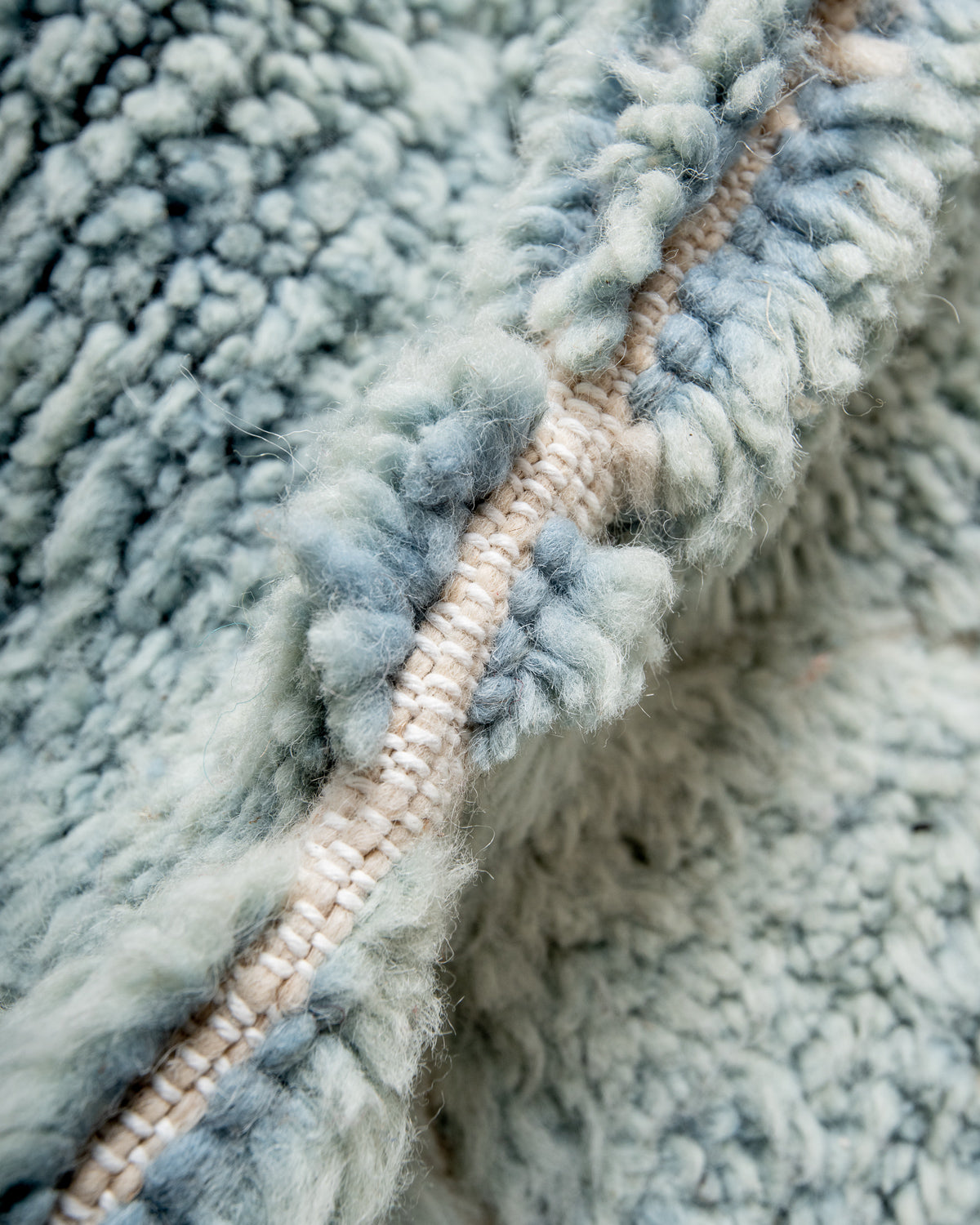 Modern, designer, handcrafted Berber rug from Morocco. Beniourain carpet with beautiful colours and patterns and fluffy wool texture.