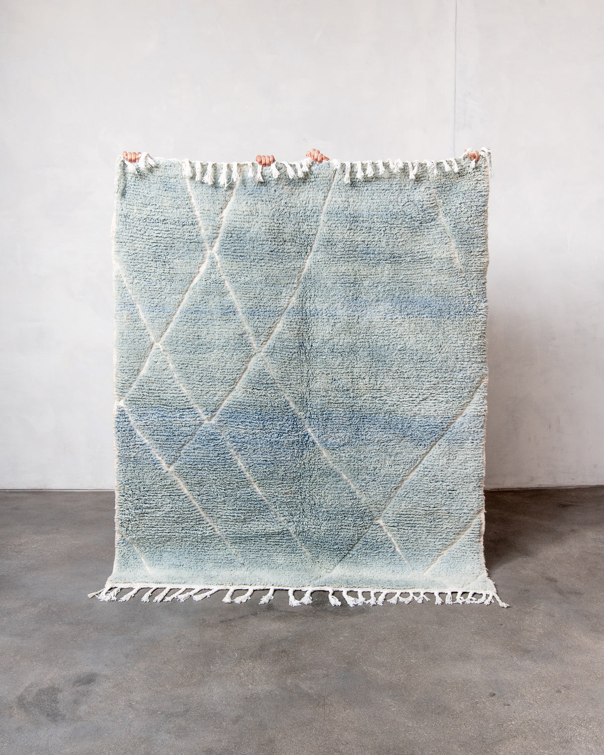 Modern, designer, handcrafted Berber rug from Morocco. Beniourain carpet with beautiful colours and patterns and fluffy wool texture.