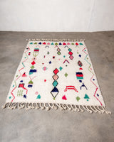 Modern, designer, handcrafted Berber rug from Morocco. Beniourain carpet with beautiful colours and patterns and fluffy wool texture.