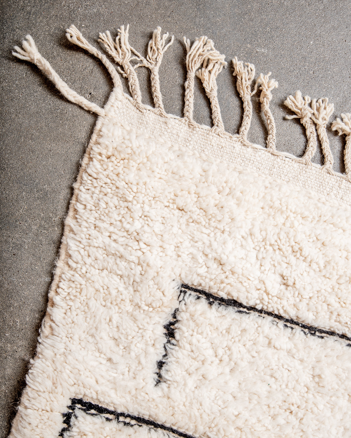 Modern, designer, handcrafted Berber rug from Morocco. Beniourain carpet with beautiful colours and patterns and fluffy wool texture.