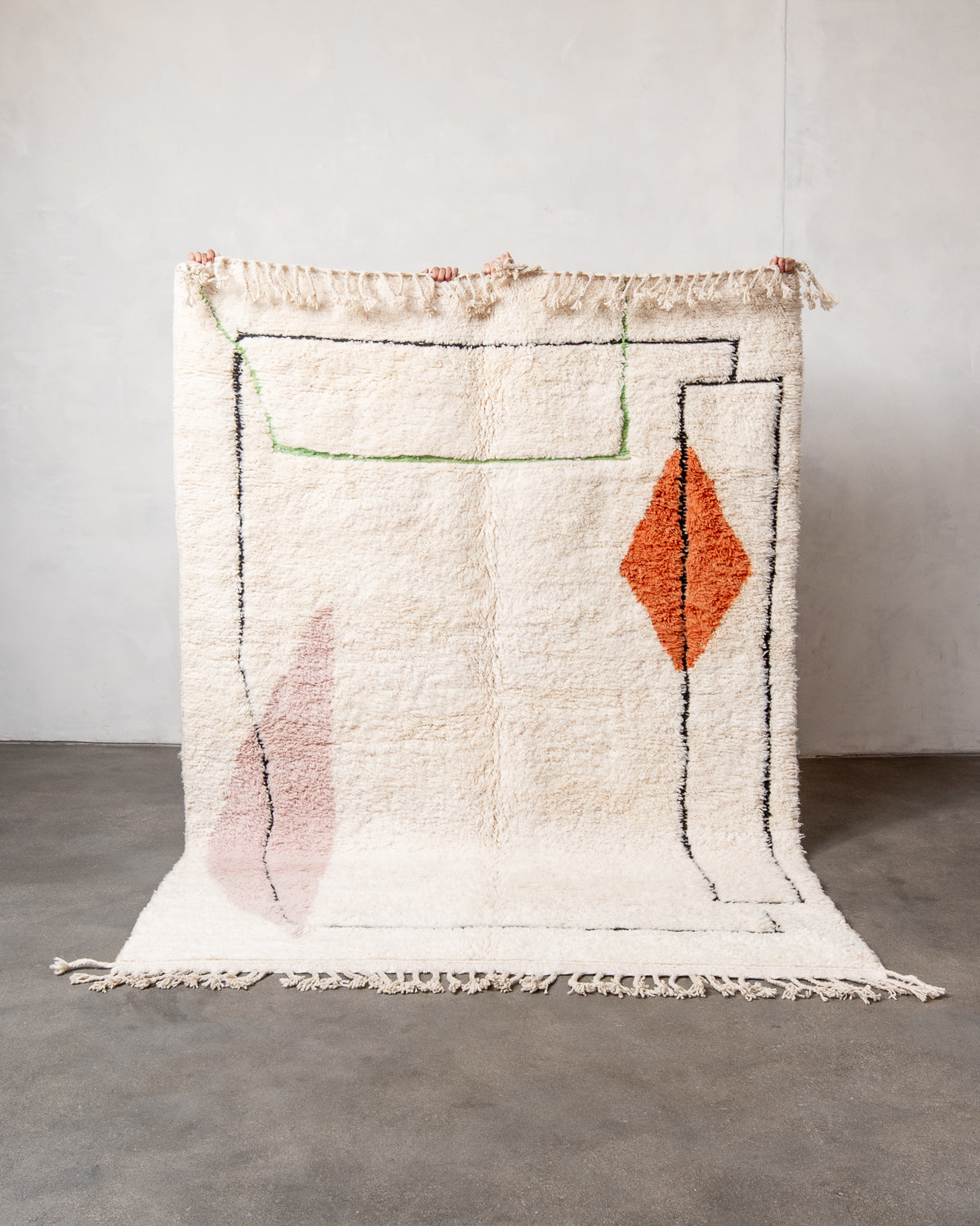 Modern, designer, handcrafted Berber rug from Morocco. Beniourain carpet with beautiful colours and patterns and fluffy wool texture.