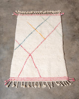 Modern, designer, handcrafted Berber rug from Morocco. Beniourain carpet with beautiful colours and patterns and fluffy wool texture.