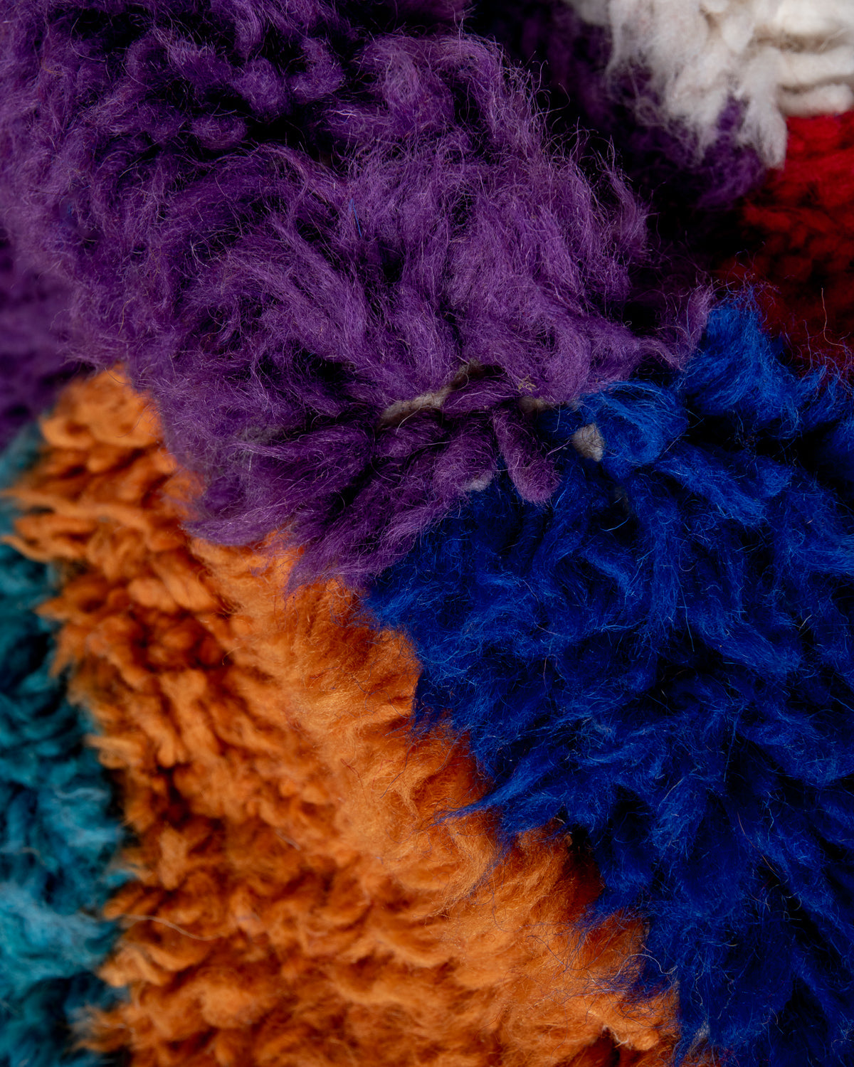 Modern, designer, handcrafted Berber runner rug from Morocco. Beniourain carpet with beautiful colours and patterns and fluffy wool texture.