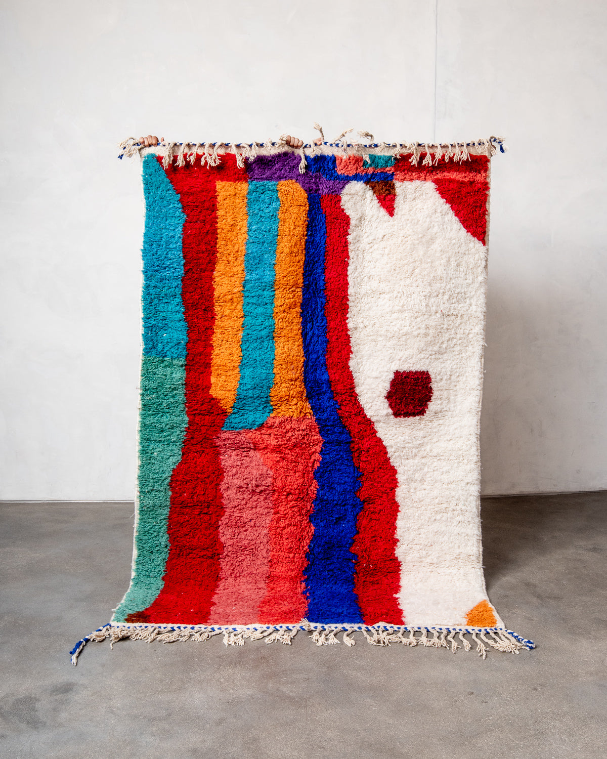 Modern, designer, handcrafted Berber runner rug from Morocco. Beniourain carpet with beautiful colours and patterns and fluffy wool texture.