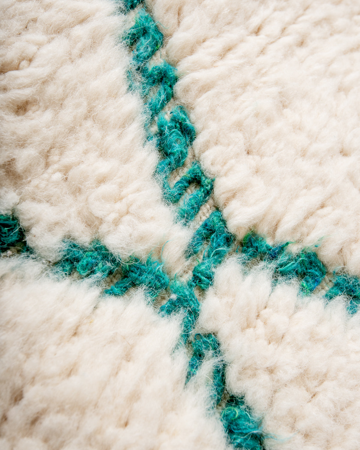 Modern, designer, handcrafted Berber runner rug from Morocco. Beniourain carpet with beautiful colours and patterns and fluffy wool texture.