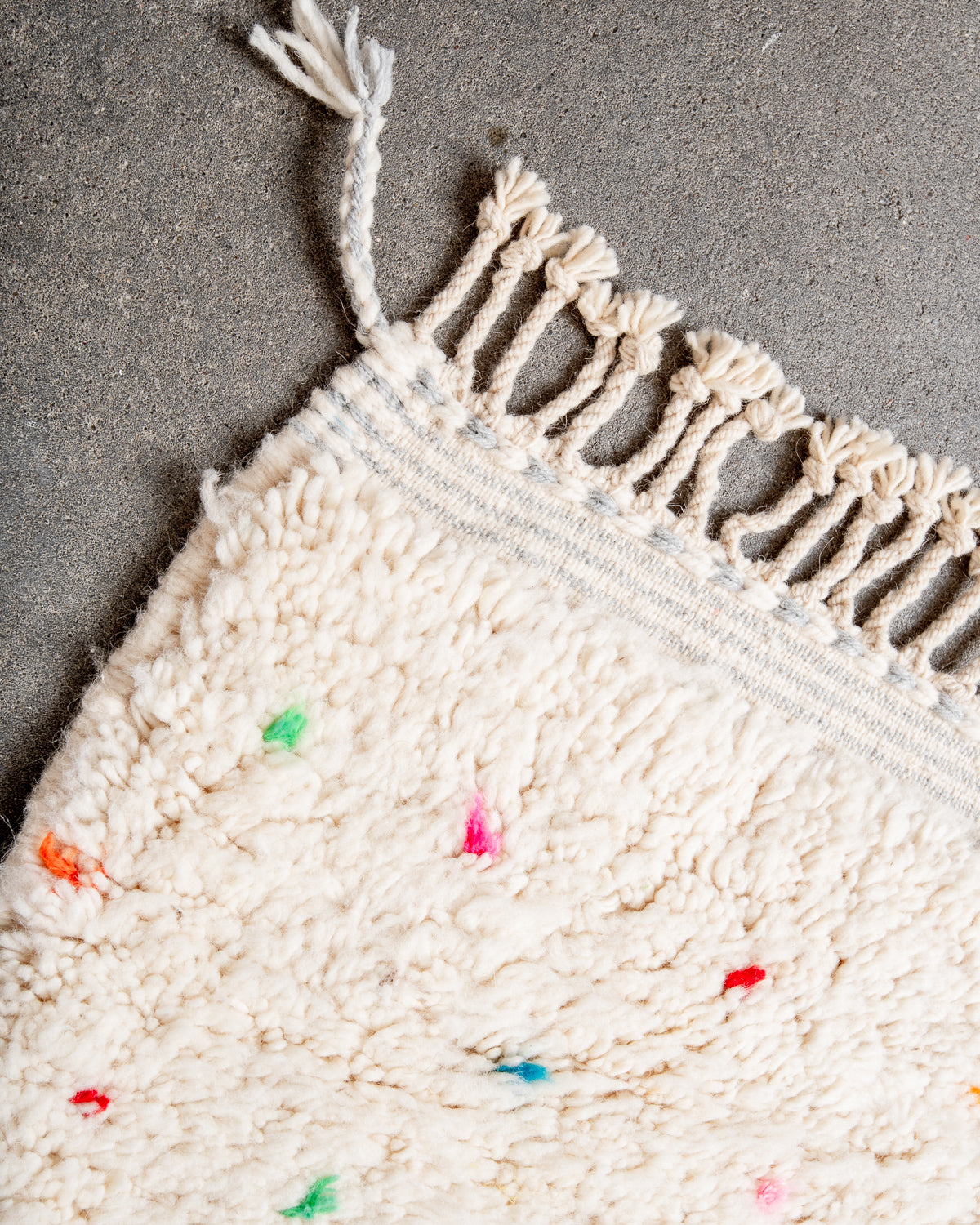 Modern, designer, handcrafted Berber rug from Morocco. Beniourain carpet with beautiful colours and patterns and fluffy wool texture.