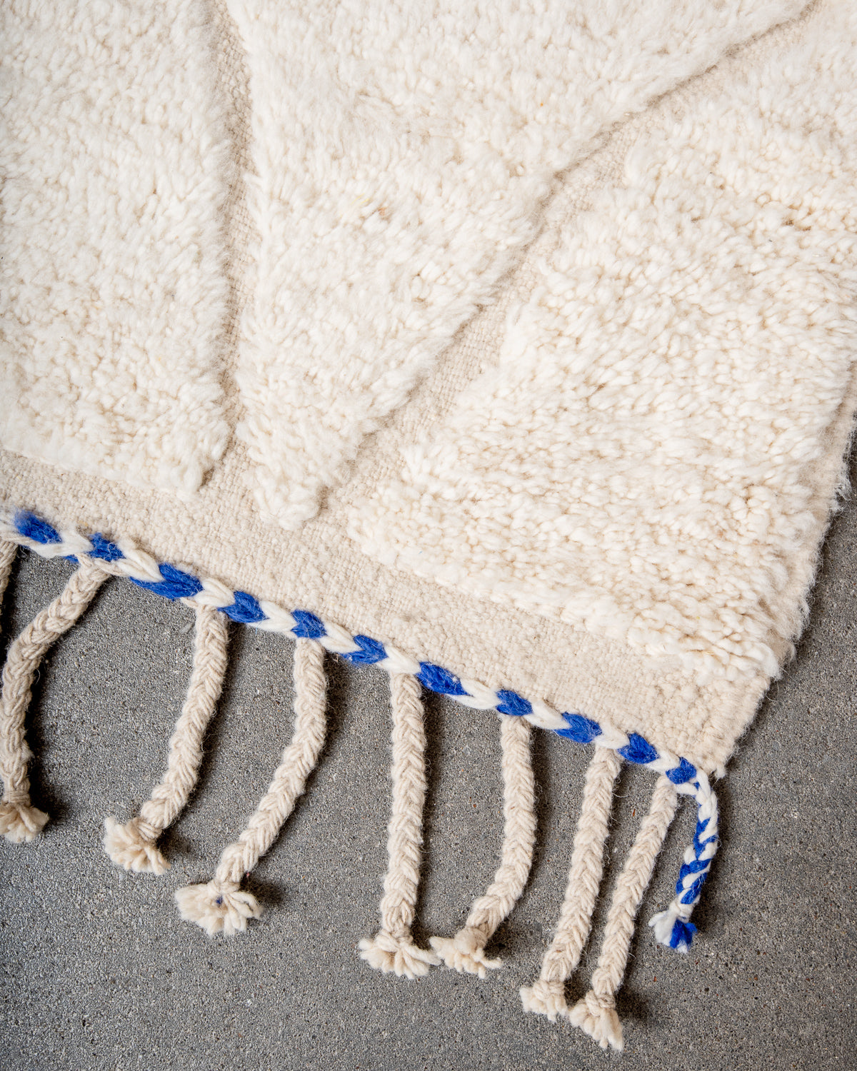 Modern, designer, handcrafted Berber rug from Morocco. Beniourain carpet with minimalist design, natural wool pile and a fluffy texture.