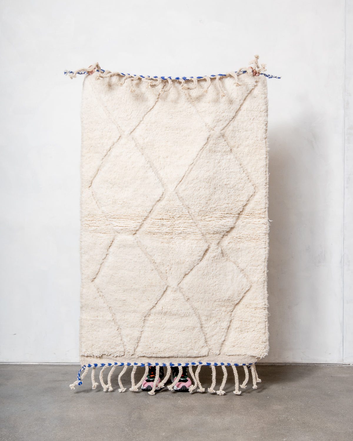 Modern, designer, handcrafted Berber rug from Morocco. Beniourain carpet with minimalist design, natural wool pile and a fluffy texture.