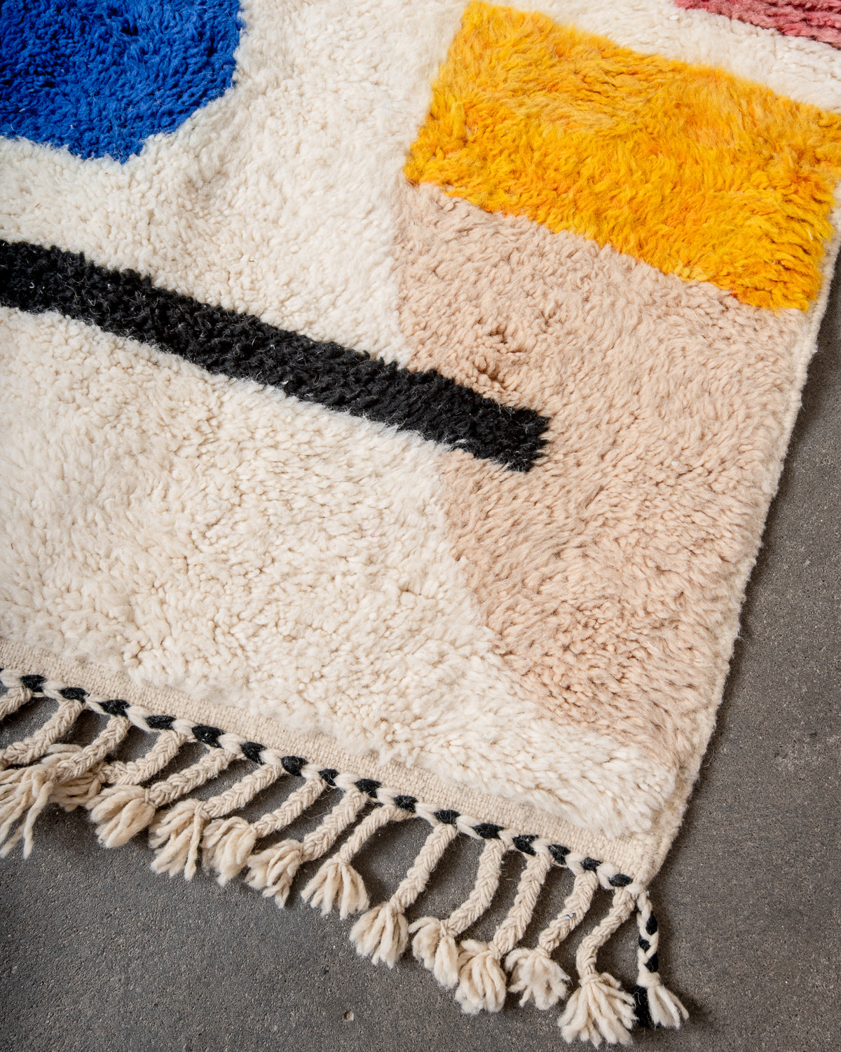 Modern, designer, handcrafted Berber rug from Morocco. Beniourain carpet with beautiful colours and patterns and fluffy wool texture. 