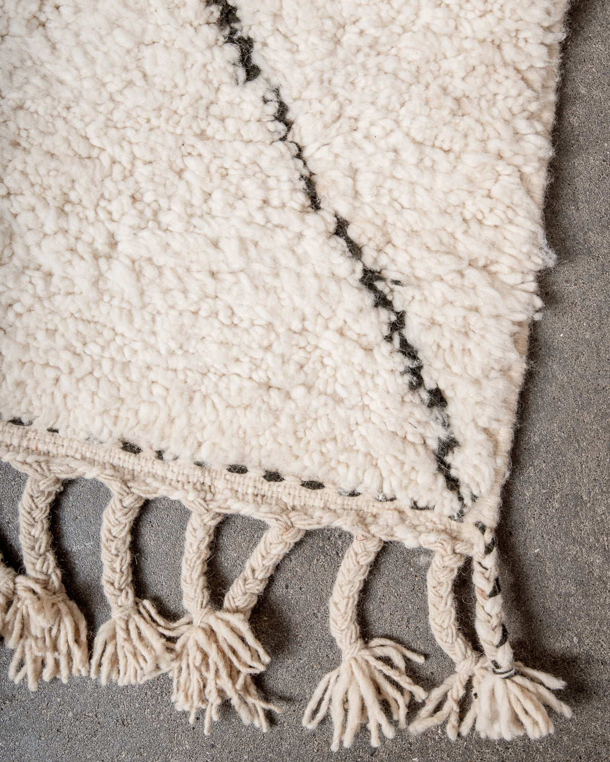 Modern, designer, handcrafted Berber rug from Morocco. Beniourain carpet with minimalist design, natural wool pile and a fluffy texture.