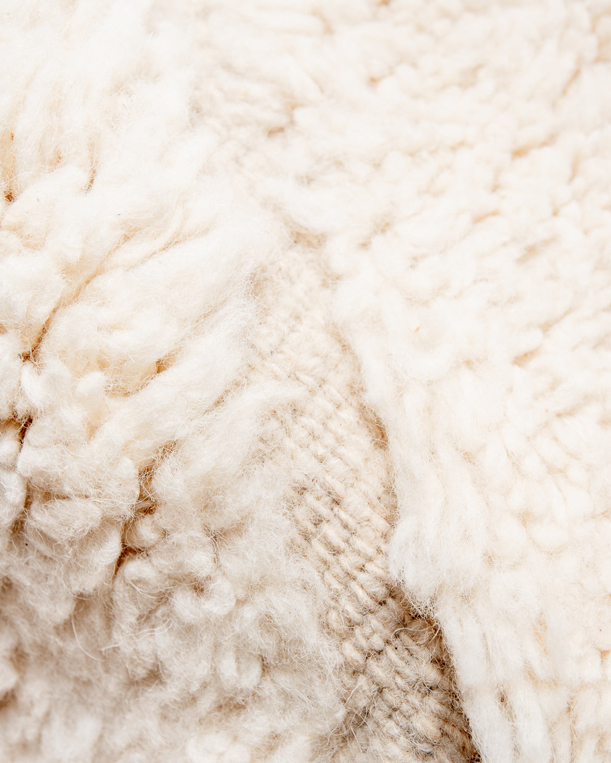 Modern, designer, handcrafted Berber rug from Morocco. Beniourain carpet with minimalist design, natural wool pile and a fluffy texture.