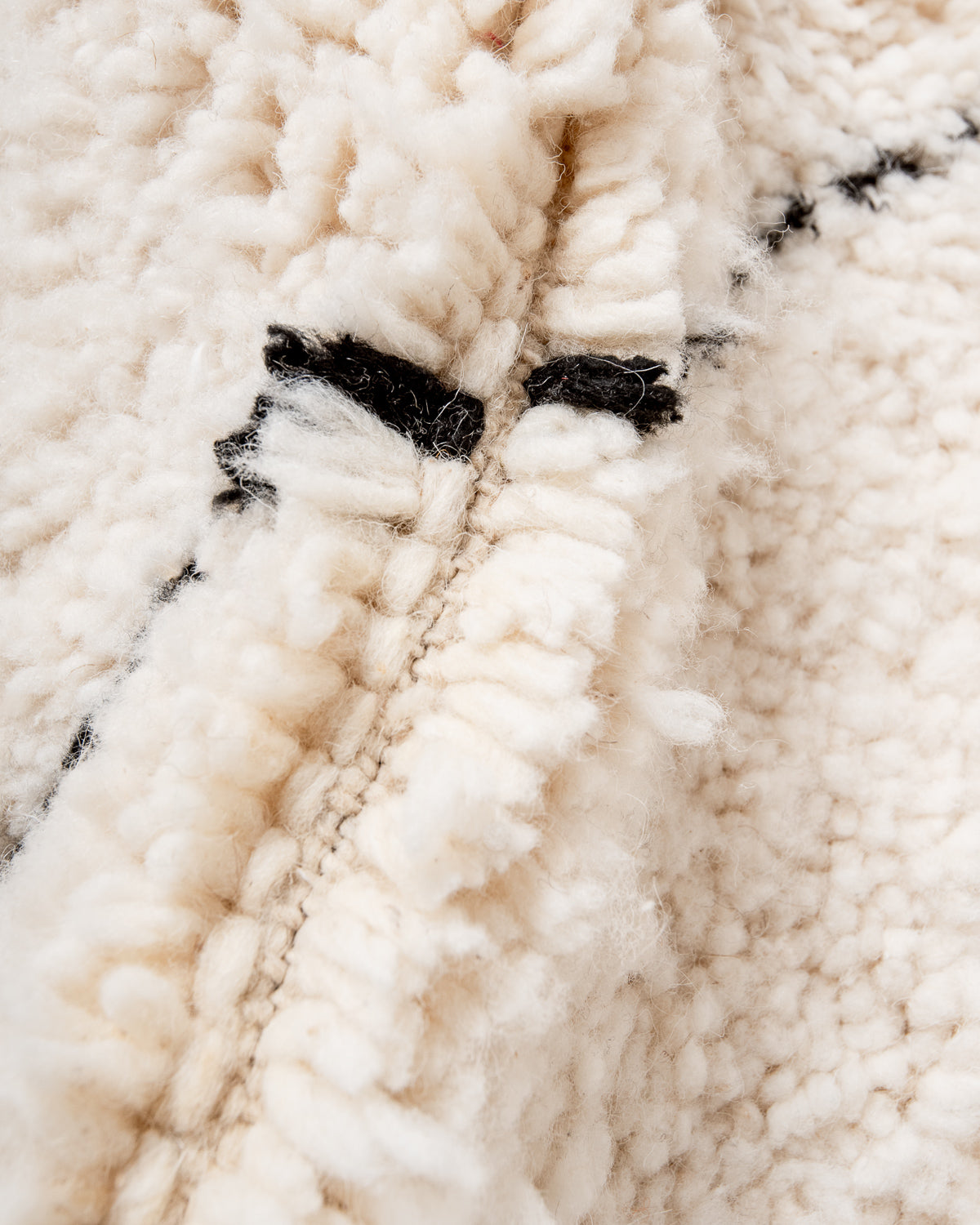 Modern, designer, handcrafted Berber rug from Morocco. Beniourain carpet with minimalist design, natural wool pile and a fluffy texture.