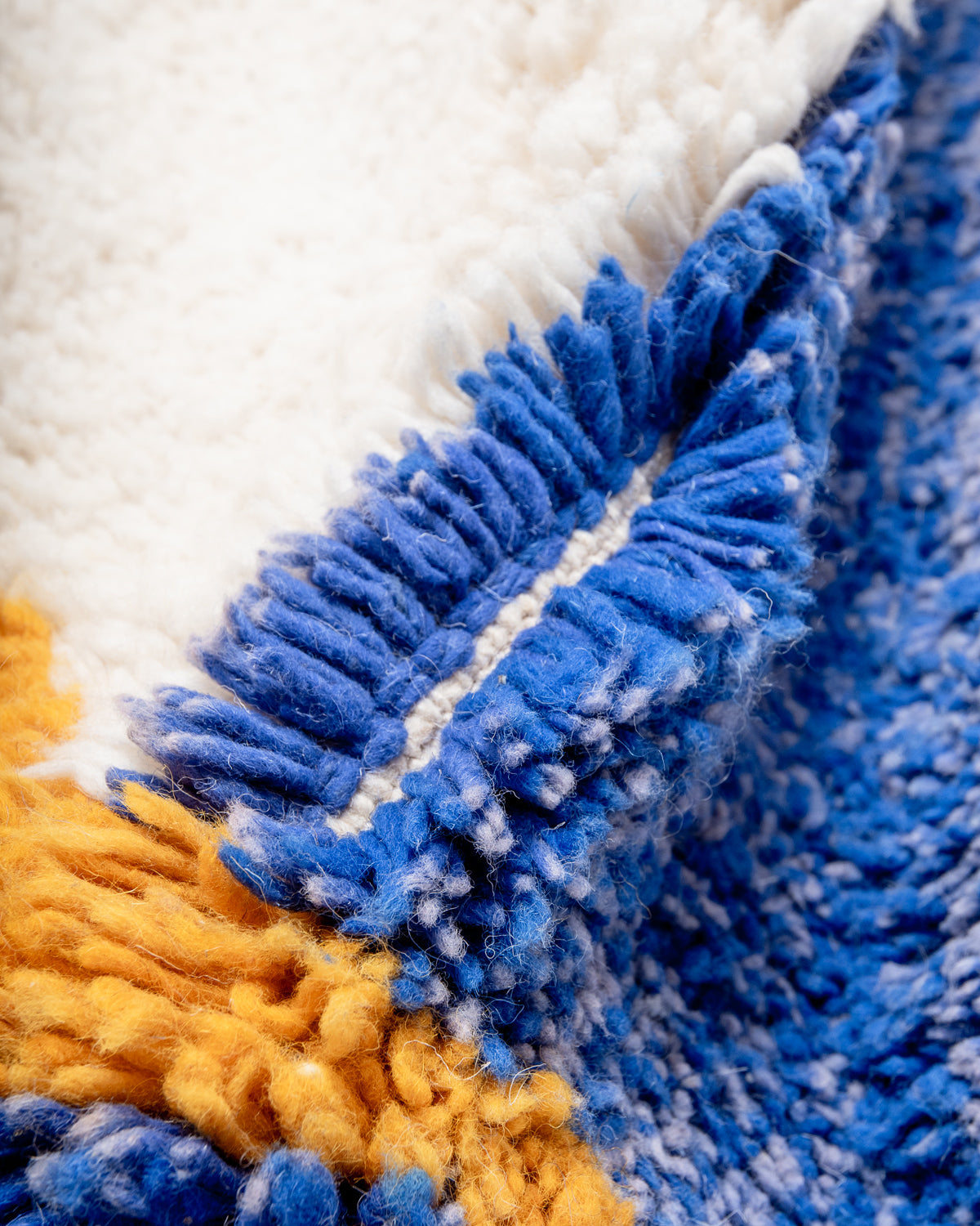 Modern, designer, handcrafted Berber rug from Morocco. Beniourain carpet with beautiful colours and patterns and fluffy wool texture. 