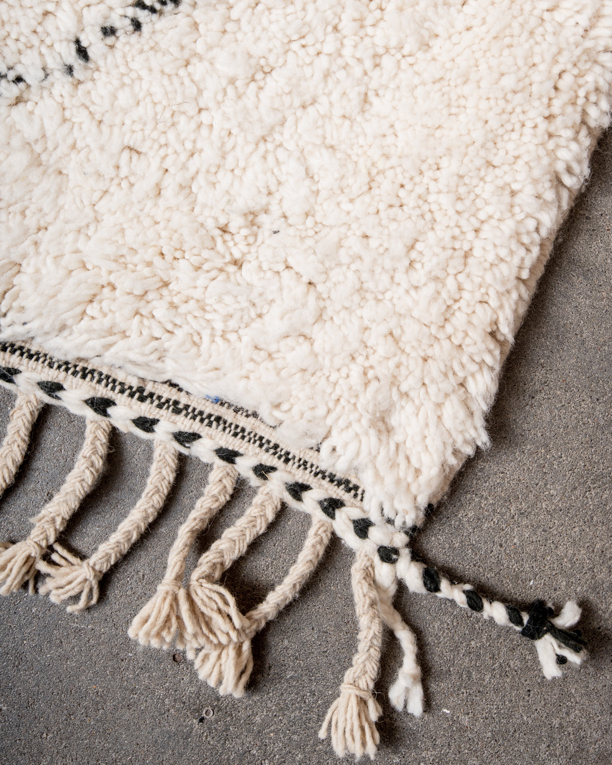 Modern, designer, handcrafted Berber rug from Morocco. Beniourain carpet with minimalist design, natural wool pile and a fluffy texture.