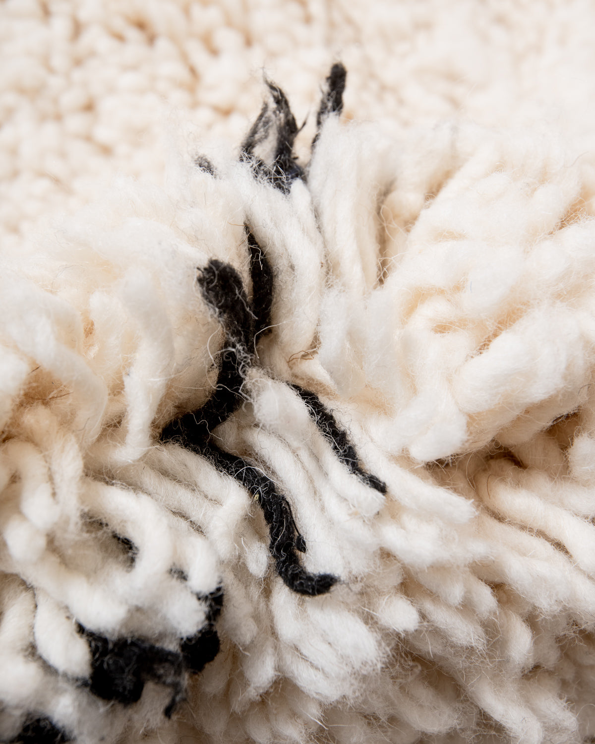 Modern, designer, handcrafted Berber rug from Morocco. Beniourain carpet with minimalist design, natural wool pile and a fluffy texture.