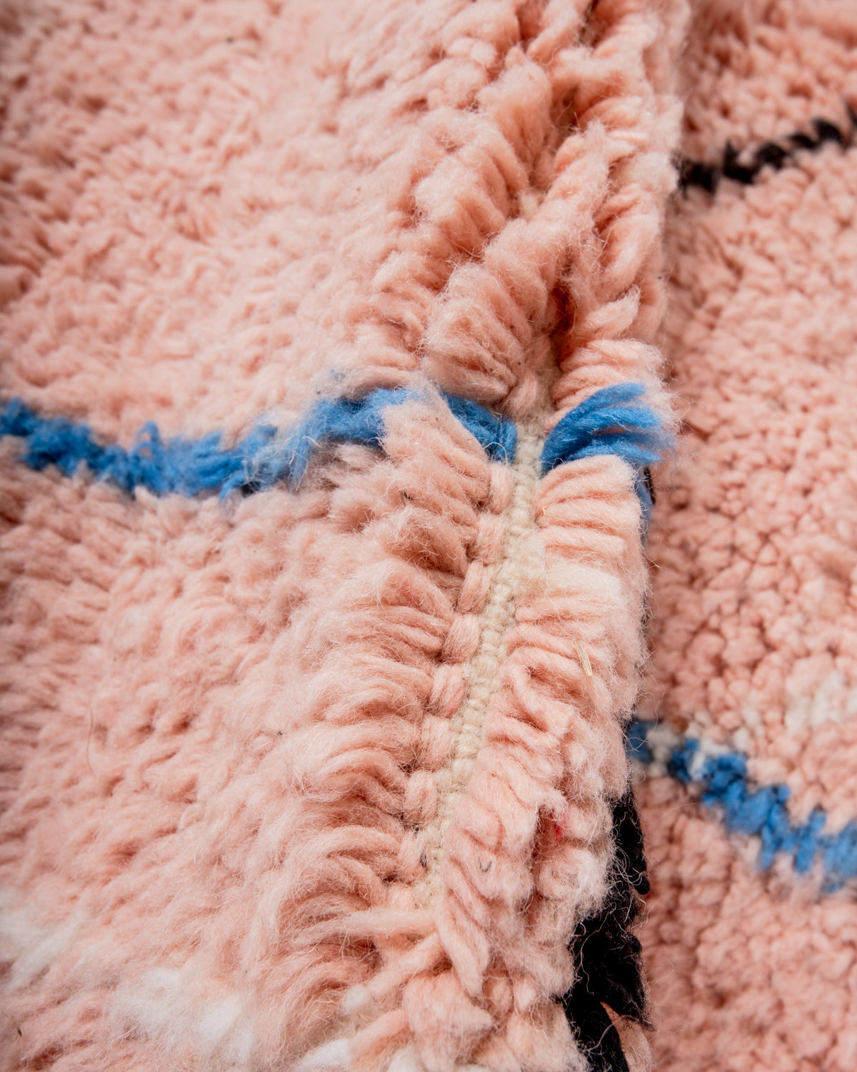 Modern, designer, handcrafted Berber rug from Morocco. Beniourain carpet with beautiful colours and patterns and fluffy wool texture.