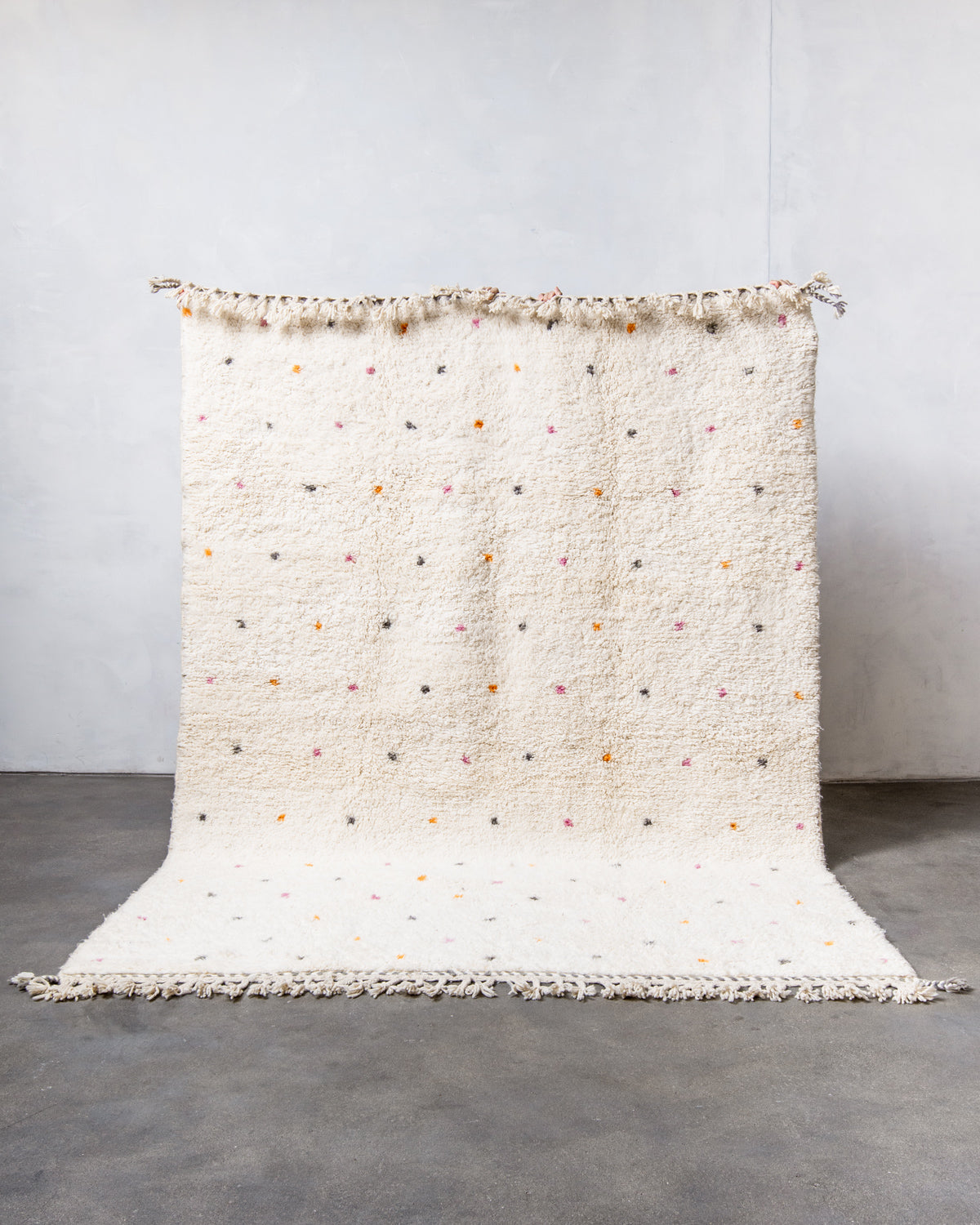 Modern, designer, handcrafted Berber rug from Morocco. Beniourain carpet with beautiful colours and patterns and fluffy wool texture.