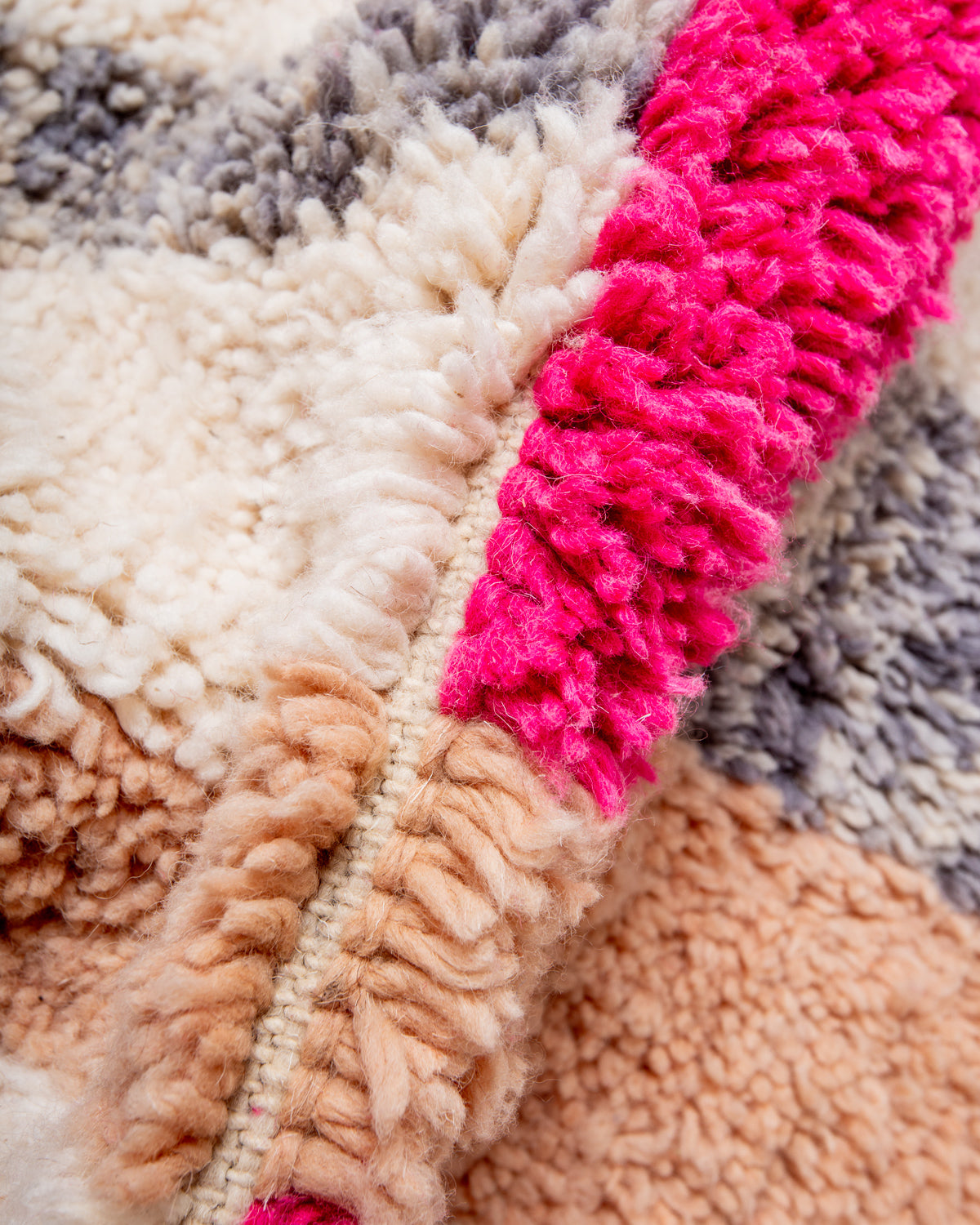 Modern, designer, handcrafted Berber rug from Morocco. Beniourain carpet with beautiful colours and patterns and fluffy wool texture.