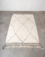 Modern, designer, handcrafted Berber rug from Morocco. Beniourain carpet with minimalist design, natural wool pile and a fluffy texture.
