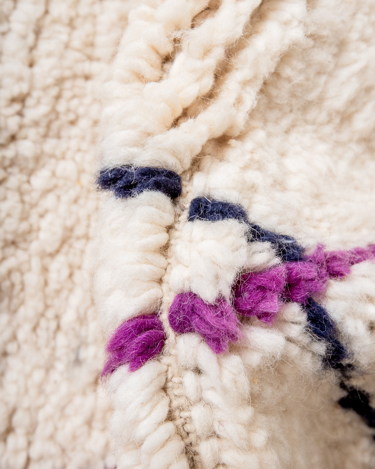 Modern, designer, handcrafted Berber rug from Morocco. Beniourain carpet with beautiful colours and patterns and fluffy wool texture.