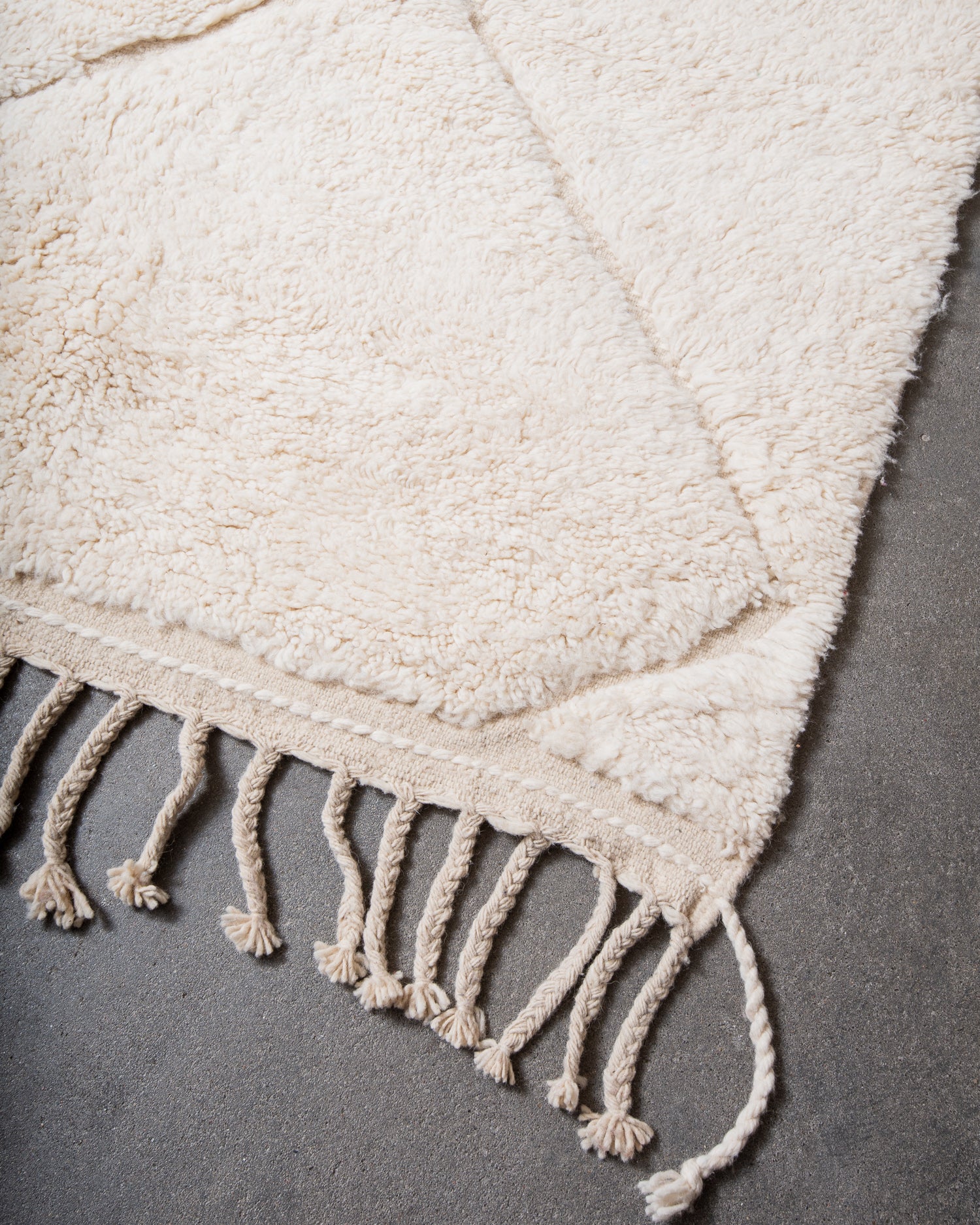 Modern, designer, handcrafted Berber rug from Morocco. Beniourain carpet with minimalist design, natural wool pile and a fluffy texture.