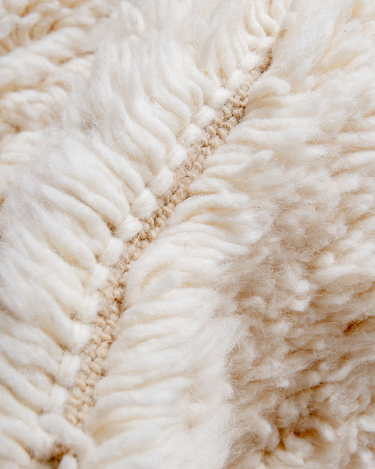 Modern, designer, handcrafted Berber rug from Morocco. Beniourain carpet with minimalist design, natural wool pile and a fluffy texture.