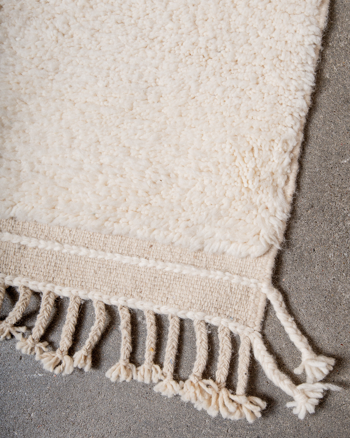 Modern, designer, handcrafted Berber rug from Morocco. Beniourain carpet with minimalist design, natural wool pile and a fluffy texture.