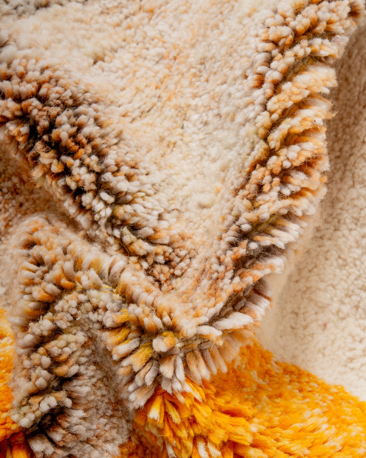 Modern, designer, handcrafted Berber rug from Morocco. Beniourain carpet with beautiful colours and patterns and fluffy wool texture.