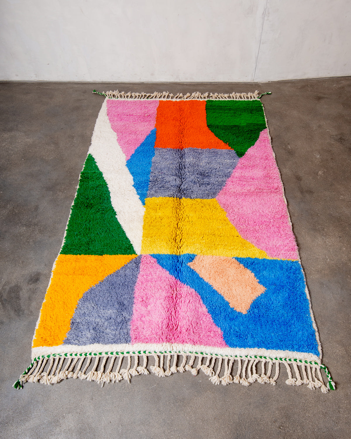 Modern, designer, handcrafted Berber rug from Morocco. Beniourain carpet with beautiful colours and patterns and fluffy wool texture.