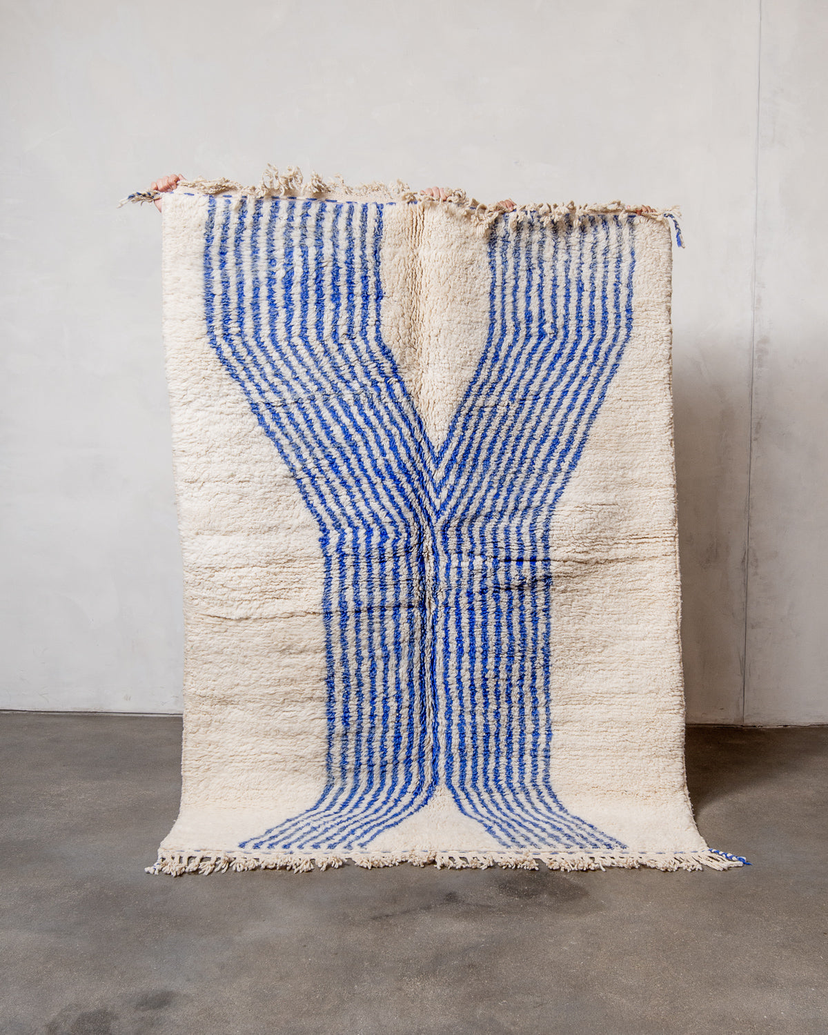 Modern, designer, handcrafted Berber rug from Morocco. Beniourain carpet with beautiful colours and patterns and fluffy wool texture.