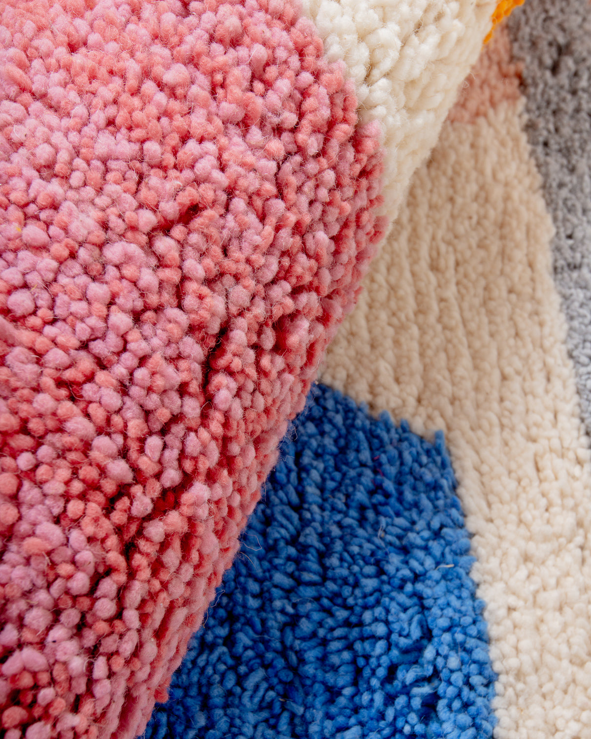 Modern, designer, handcrafted Berber rug from Morocco. Beniourain carpet with beautiful colours and patterns and fluffy wool texture.