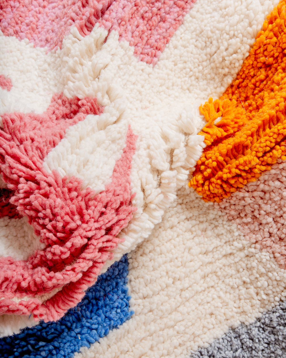 Modern, designer, handcrafted Berber rug from Morocco. Beniourain carpet with beautiful colours and patterns and fluffy wool texture.