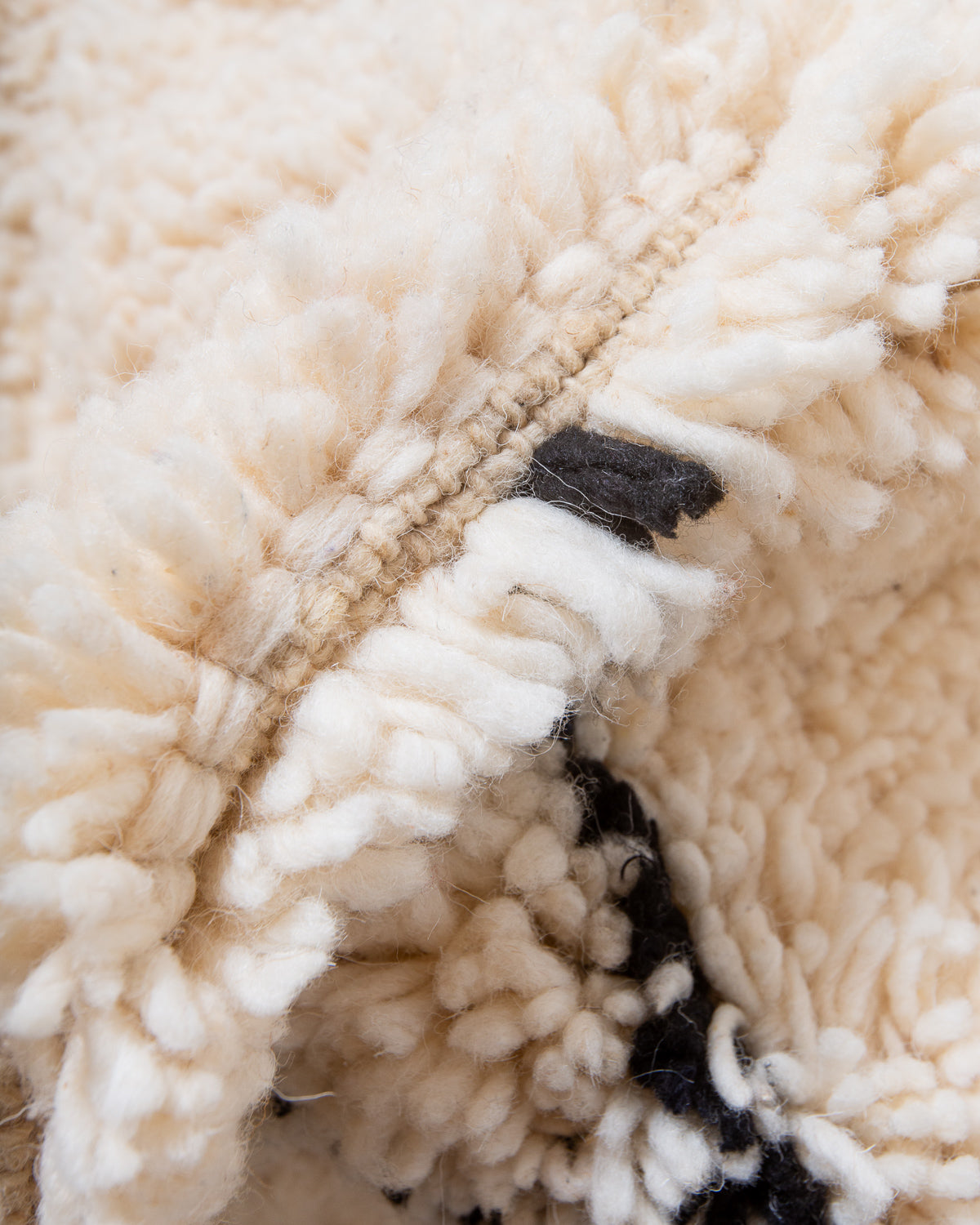 Modern, designer, handcrafted Berber rug from Morocco. Beniourain carpet with minimalist design, natural wool pile and a fluffy texture.