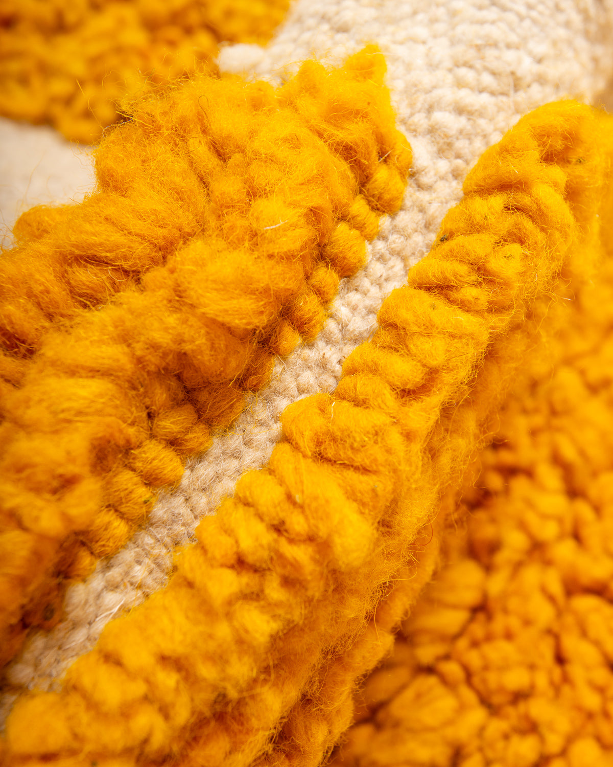 Modern, designer, handcrafted Berber rug from Morocco. Beniourain carpet with beautiful colours and patterns and fluffy wool texture.