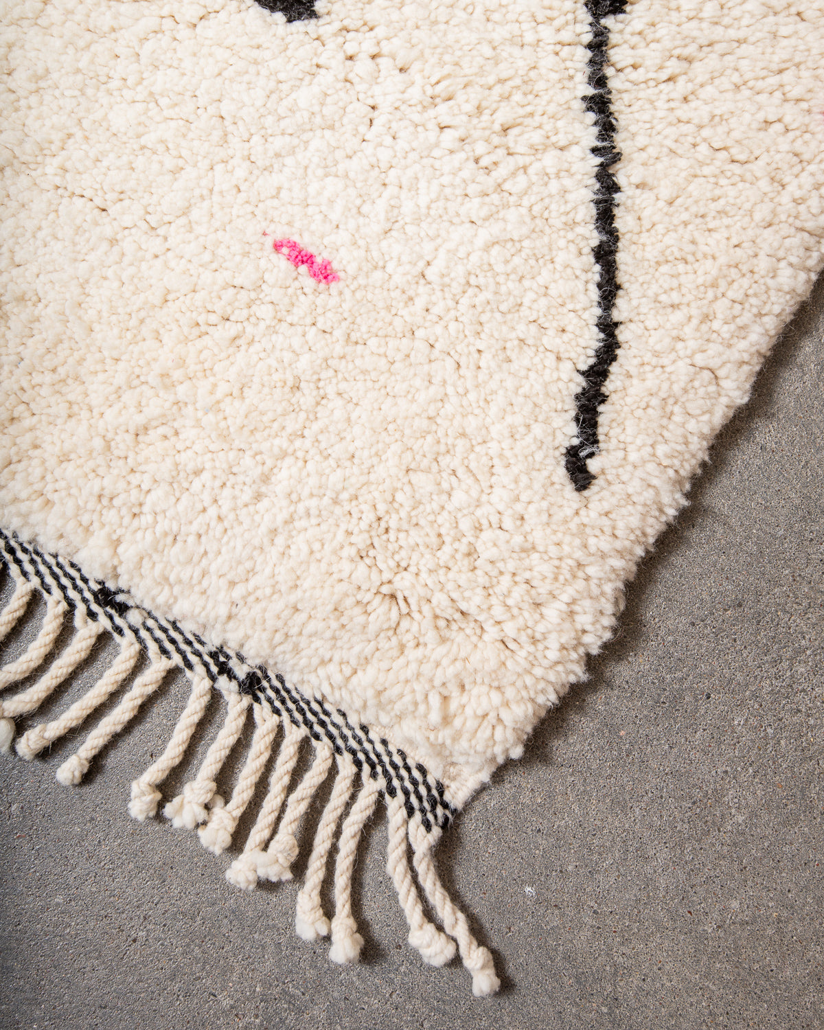 Modern, designer, handcrafted Berber rug from Morocco. Beniourain carpet with minimalist design, natural wool pile and a fluffy texture.