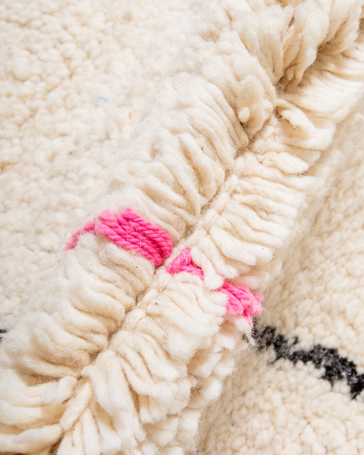 Modern, designer, handcrafted Berber rug from Morocco. Beniourain carpet with minimalist design, natural wool pile and a fluffy texture.