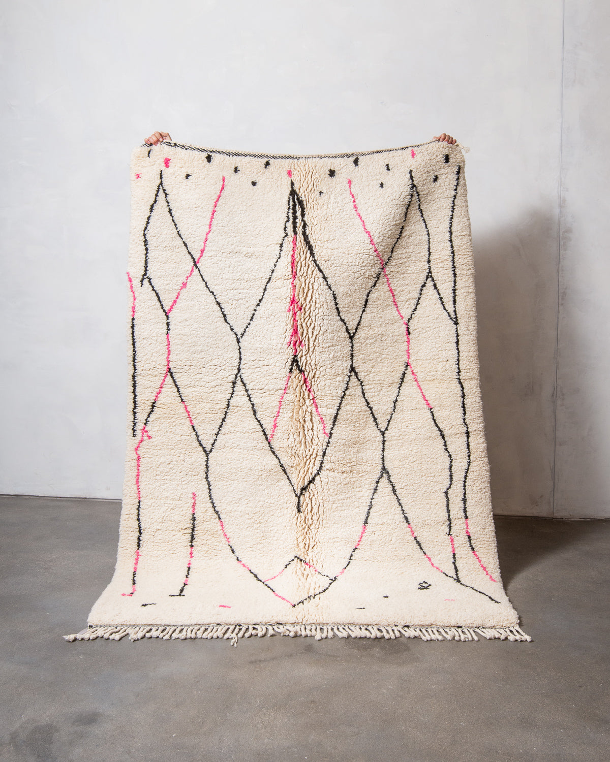 Modern, designer, handcrafted Berber rug from Morocco. Beniourain carpet with minimalist design, natural wool pile and a fluffy texture.