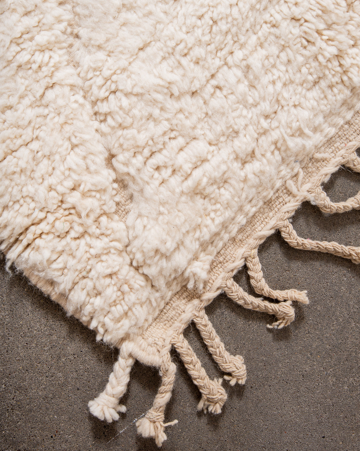 Modern, designer, handcrafted Berber rug from Morocco. Beniourain carpet with minimalist design, natural wool pile and a fluffy texture.