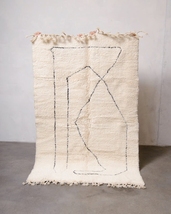 Modern, designer, handcrafted Berber rug from Morocco. Beniourain carpet with minimalist design, natural wool pile and a fluffy texture.