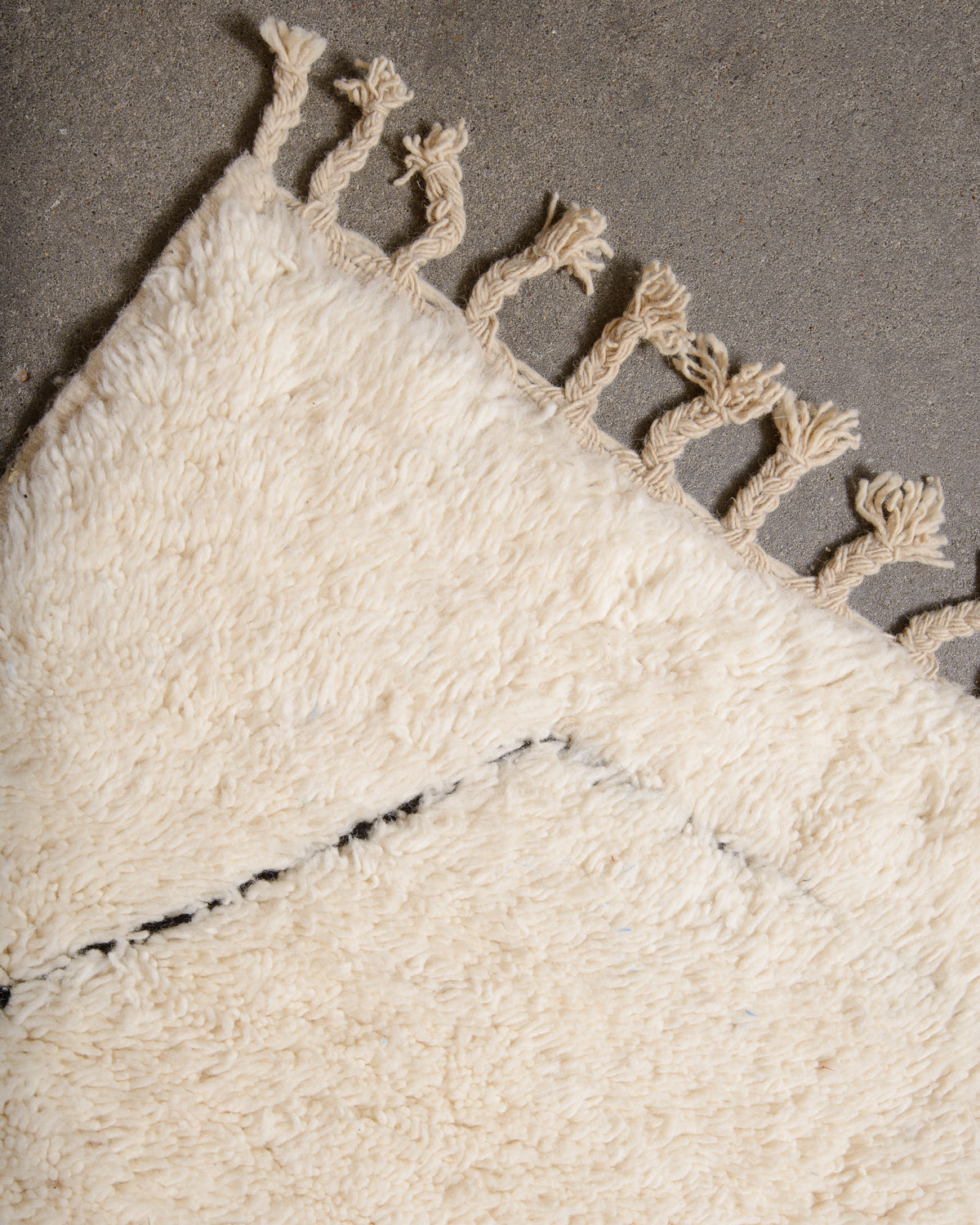 Modern, designer, handcrafted Berber rug from Morocco. Beniourain carpet with minimalist design, natural wool pile and a fluffy texture.