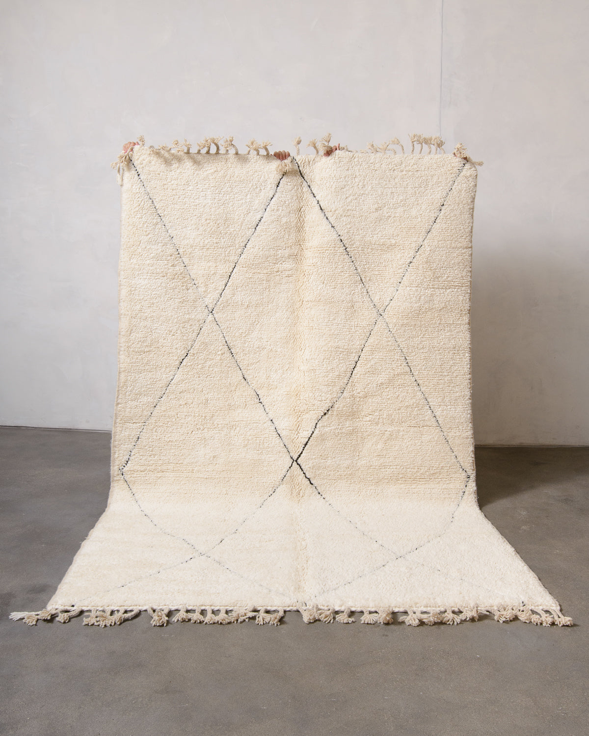 Modern, designer, handcrafted Berber rug from Morocco. Beniourain carpet with minimalist design, natural wool pile and a fluffy texture.