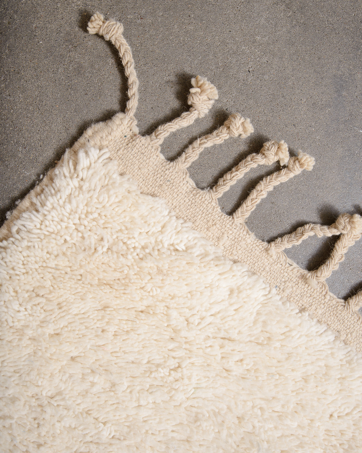 Modern, designer, handcrafted Berber rug from Morocco. Beniourain carpet with minimalist design, natural wool pile and a fluffy texture.