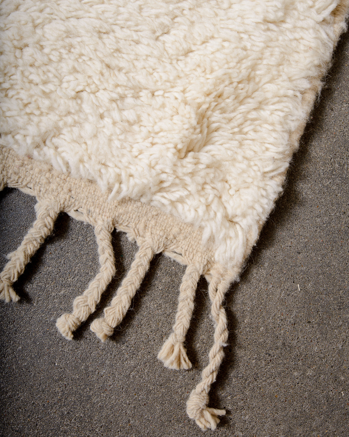 Modern, designer, handcrafted Berber rug from Morocco. Beniourain carpet with minimalist design, natural wool pile and a fluffy texture.