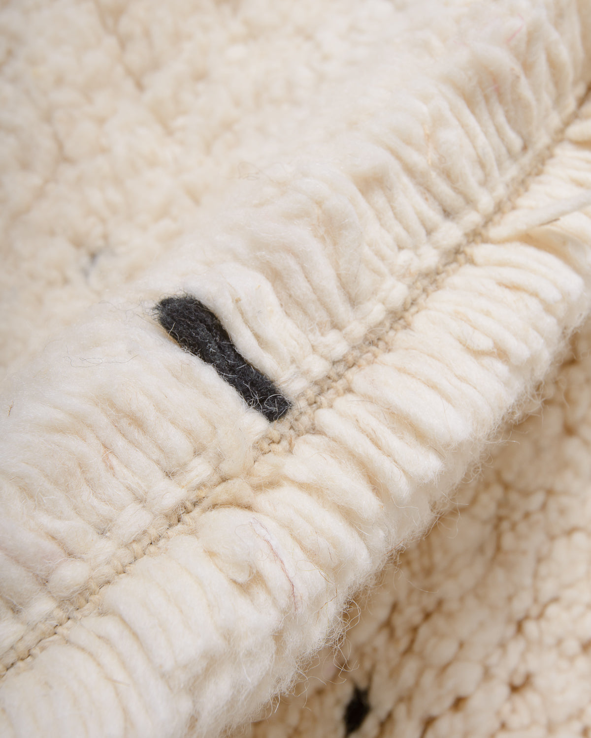 Modern, designer, handcrafted Berber rug from Morocco. Beniourain carpet with minimalist design, natural wool pile and a fluffy texture.