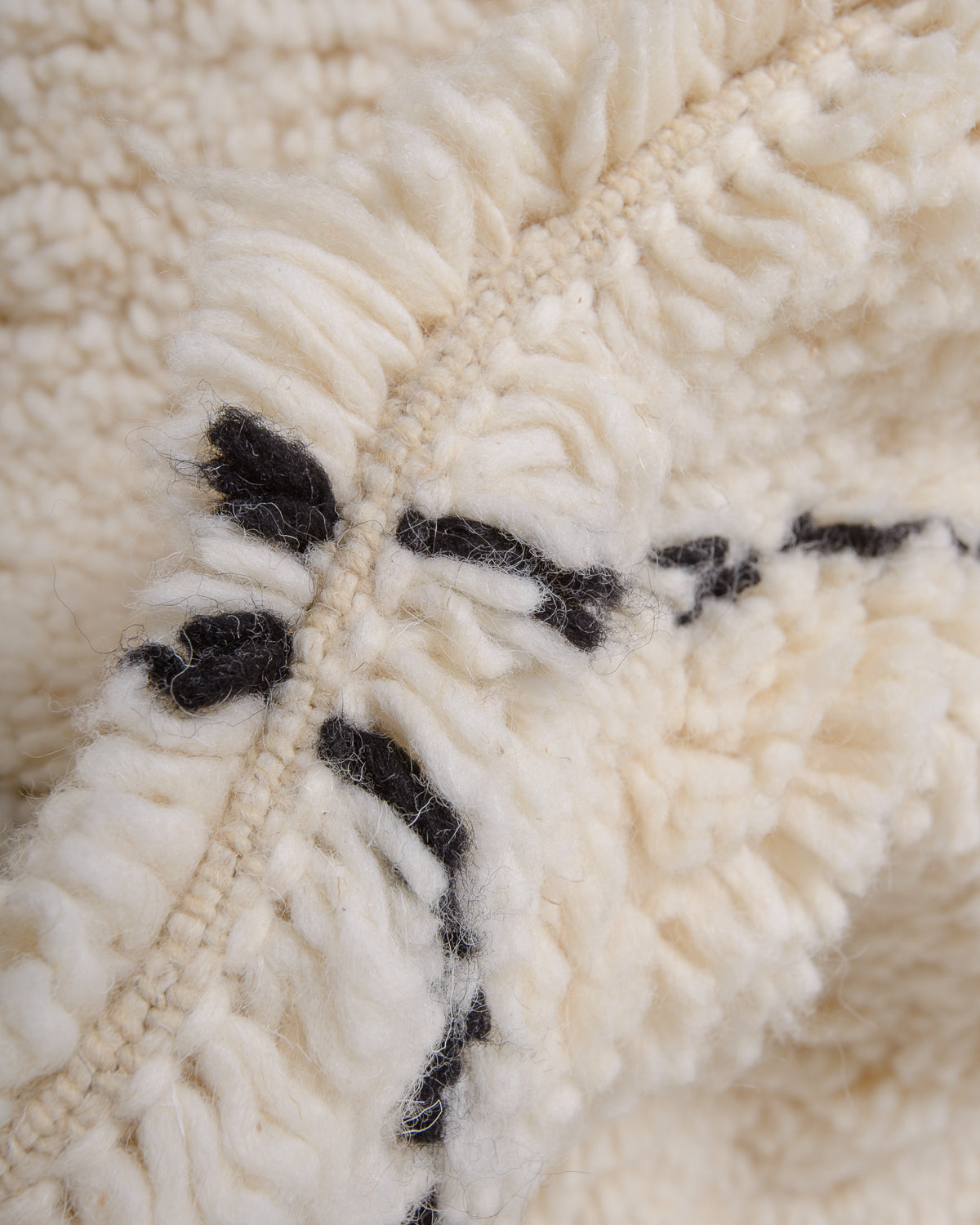 Modern, designer, handcrafted Berber rug from Morocco. Beniourain carpet with minimalist design, natural wool pile and a fluffy texture.