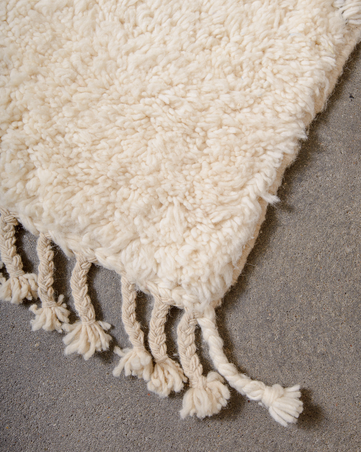 Modern, designer, handcrafted Berber rug from Morocco. Beniourain carpet with minimalist design, natural wool pile and a fluffy texture.