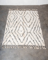 Modern, designer, handcrafted Berber rug from Morocco. Beniourain carpet with minimalist design, natural wool pile and a fluffy texture.