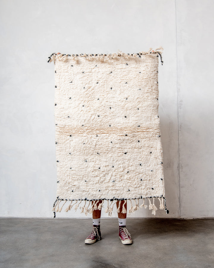 Modern, designer, handcrafted Berber rug from Morocco. Beniourain carpet with minimalist design, natural wool pile and a fluffy texture.