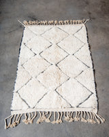 Modern, designer, handcrafted Berber rug from Morocco. Beniourain carpet with minimalist design, natural wool pile and a fluffy texture.